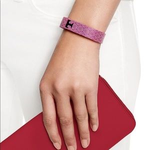 Tory Burch pink silicone rubber Fitbit bracelet